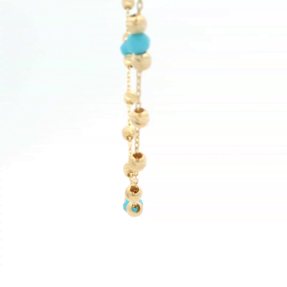 Elegante Halskette aus Gold und türkisen Perlen