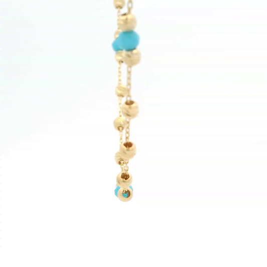 Elegante Halskette aus Gold und türkisen Perlen