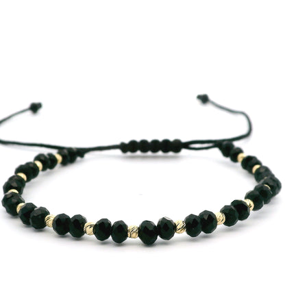 Elegantes schwarzes Armband mit 585er goldenen Kugeln