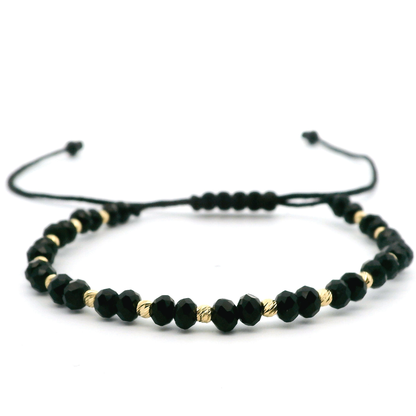 Elegantes schwarzes Armband mit 585er goldenen Kugeln