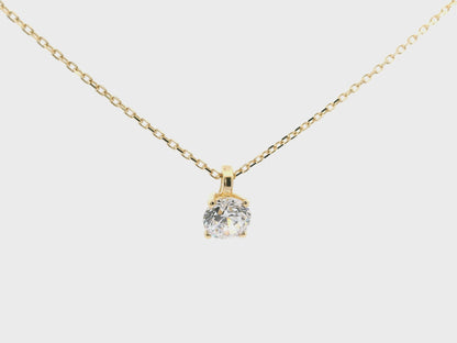 Eleganter goldener Anhänger mit Zirkonia-Stein in 4-Krabbenfassung